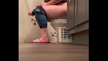 Older lady caught using restroom